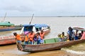School children in Albina, Surinam, return home by boat from French Guyana Royalty Free Stock Photo