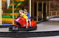 Children on amusement park ride Royalty Free Stock Photo