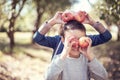 Children with Apple in Orchard. Harvest Concept