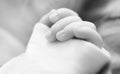 Children arm, fingers closeup. Newborn