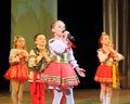 Children artists in national dress