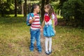 Children with backpacks. Boy and girl are friends. Back to school. The concept of education, school, childhood Royalty Free Stock Photo