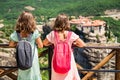 Children visiting the famous Meteora monastery in Greece Royalty Free Stock Photo