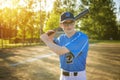 A children baseball players standing on the playground