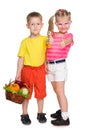 Children with a basket of vegetables