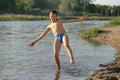 Children bathe in the evening on the city beach