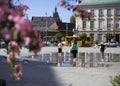 Children bathe in a fountain in the old town square