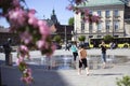 Children bathe in a fountain in the old town square Royalty Free Stock Photo