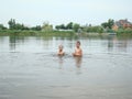 Children bathing in the river