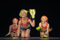 Children in bathing suits dancing on stage Royalty Free Stock Photo