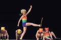 Children in bathing suits dancing on stage Royalty Free Stock Photo