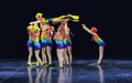 Children in bathing suits dancing on stage Royalty Free Stock Photo