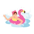 Children beach activities and fun. Little girl swimming in sea on flamingo swimming circle, relax outdoors. Adorable Royalty Free Stock Photo