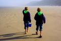 Children on Beach. Backs to Camera. Cannon Beach.