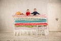 Children on the bed - Princess and the Pea. Royalty Free Stock Photo