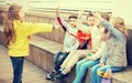 Children on bench playing children`s games