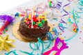Children birthday party with chocolate cake