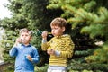 Children blow bubbles Royalty Free Stock Photo