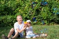 Children blow bubbles Royalty Free Stock Photo