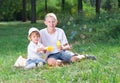 Children blow bubbles Royalty Free Stock Photo