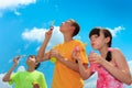Children blowing bubbles Royalty Free Stock Photo