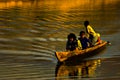 Children on boat and sunset