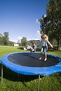 Children bouncing. Royalty Free Stock Photo