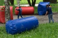 Children with bows playing paintball