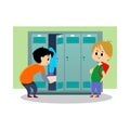 Children boys near lockers in the locker room of the school dress up and put their personal belongings and books for