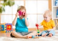 Children boys playing with educational toys