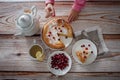 Children breakfast with Cheesecake with cranberries and sugar