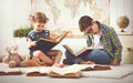 Children brother and sister, boy and girl reading a book