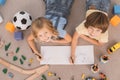 Children brother and sister family time together indoors Royalty Free Stock Photo