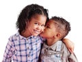 Children, brother and sister siblings kiss on cheek in family portrait with love and care. Kids, hug and smile together Royalty Free Stock Photo