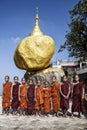 Children Buddhas in front of the golden rock, Birmania, Myanmar