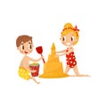 Children building castle from sand. Cute boy and girl in swimwear. Kids playing at beach. Summer outdoor activity. Flat Royalty Free Stock Photo