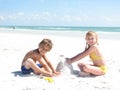 Children building sandcastles