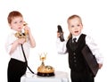 Children in business suit with telephone. Royalty Free Stock Photo