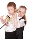 Children in business suit with telephone. Royalty Free Stock Photo