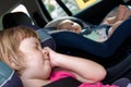 Children in a car seats Royalty Free Stock Photo