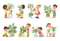Children care of home plants. Happy people growing houseplants. Kids with domestic potted flowers. Girl watering cactus Royalty Free Stock Photo