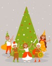 Children in carnival costumes dance around the Christmas tree