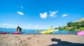 Children carrying colorful paddle boards Royalty Free Stock Photo