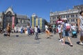 Children catch soap bubbles in the central Dam Square in Amsterdam