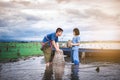 Children catching fish and have fun in the canal. Life style of children