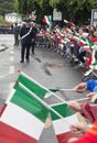 Children celebrate the arrival of the President