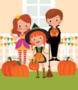 Children in celebration of Halloween on the doorstep