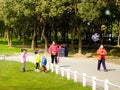 Children chasing bubbles Royalty Free Stock Photo