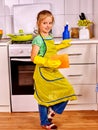 Children cleaning kitchen