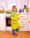 Children cleaning kitchen